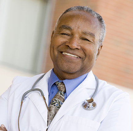 Mature black doctor smiling