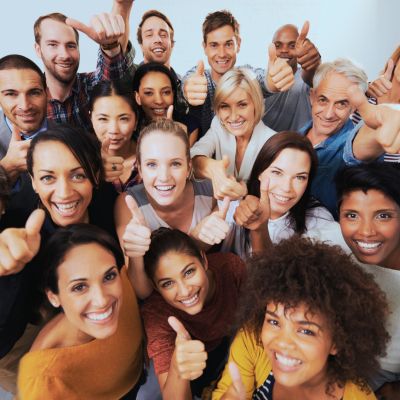 Group of people with thumbs up